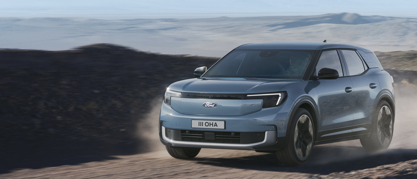 Ford Explorer kører på grusvej